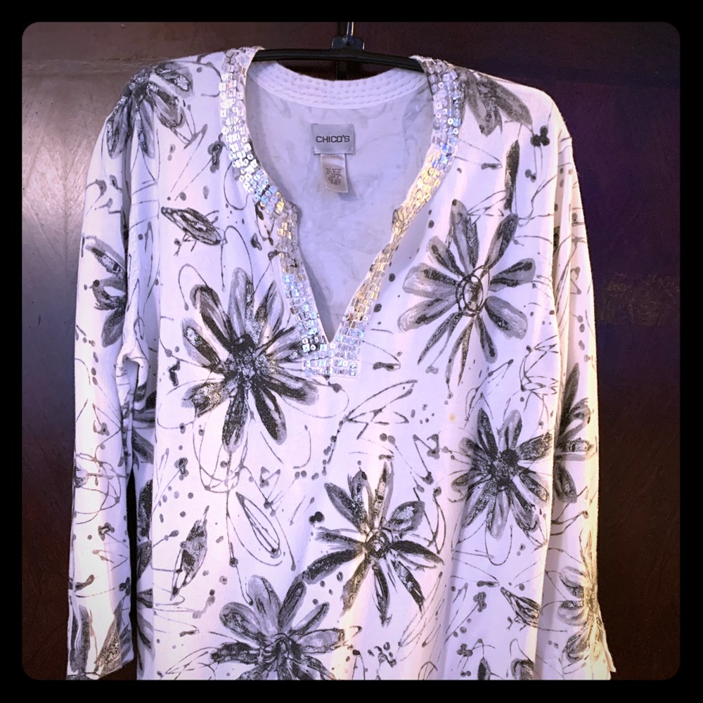 Tunic sweater with embellishments